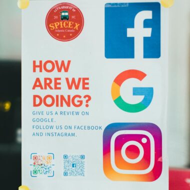 Poster encouraging reviews on Google, Facebook, and Instagram.